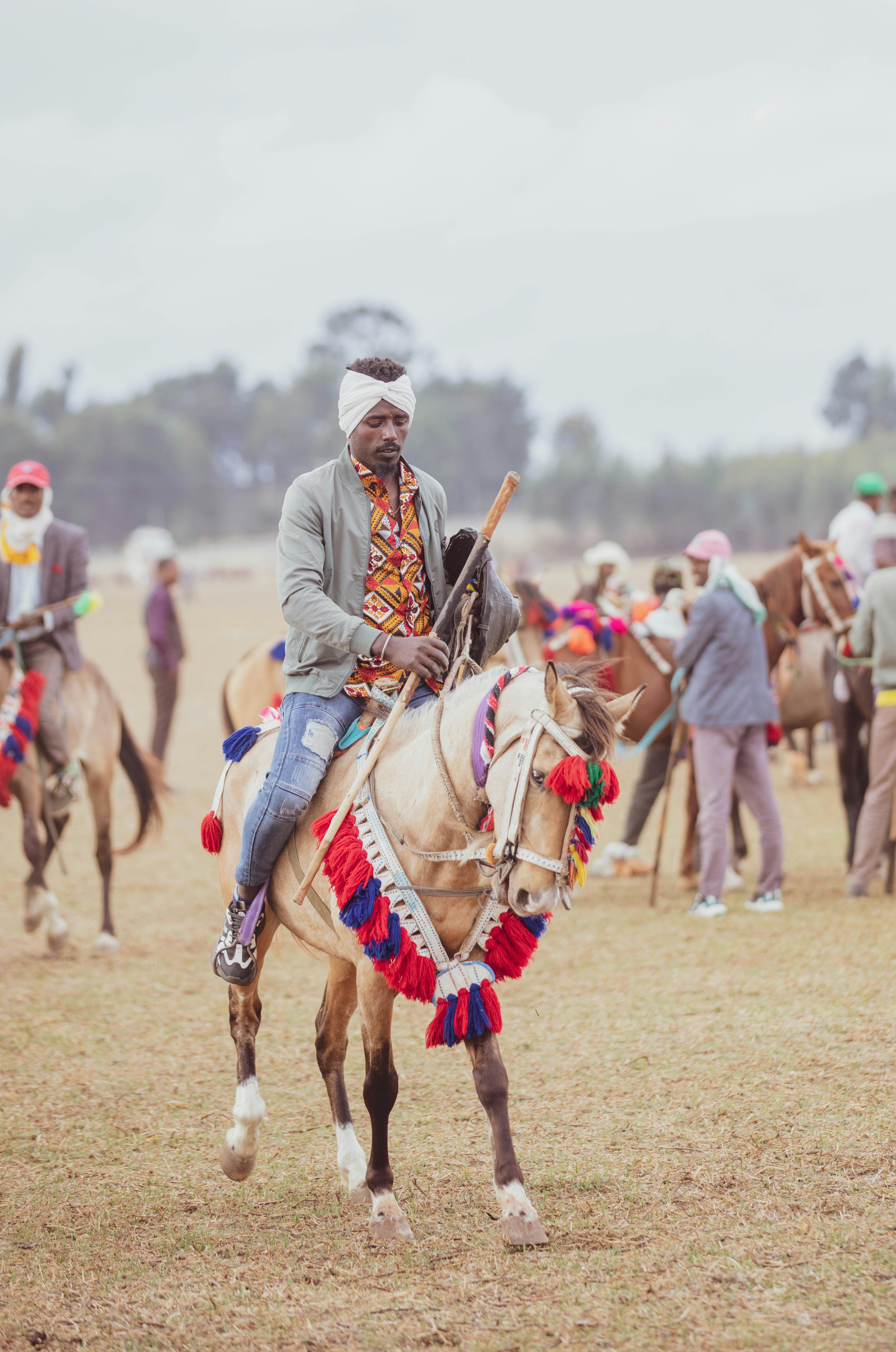 man riding a horse in a game