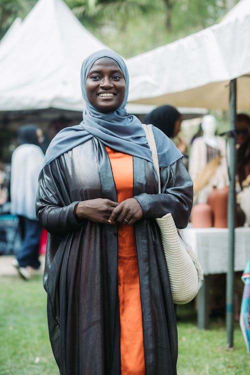 Woman in Black Gown and Headscarf