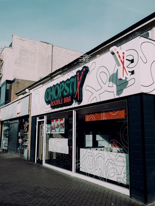 A store front with graffiti on it
