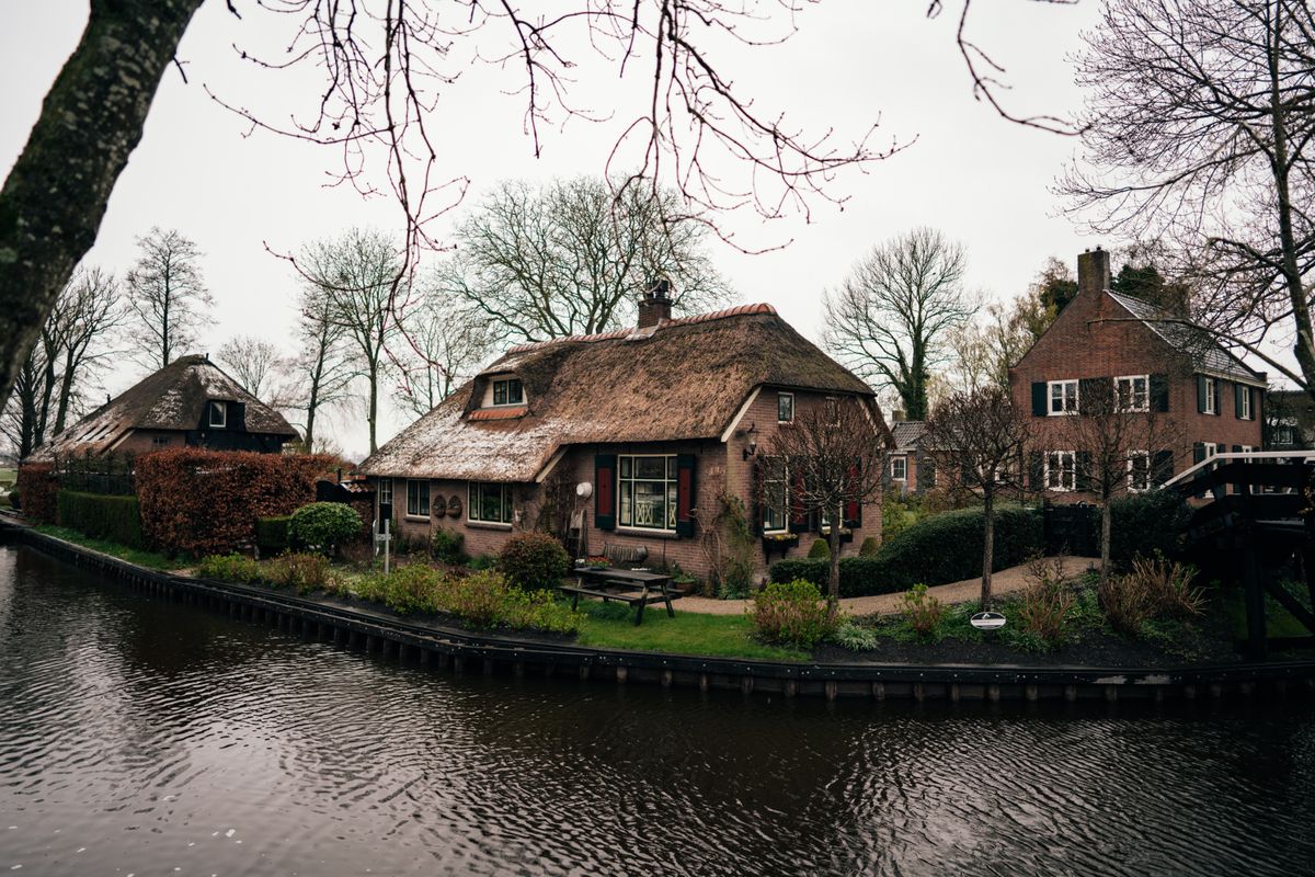 Thatched cottages along a canal in Giethoorn