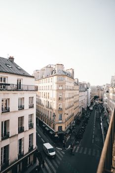 High-angle view of a Parisian street showcasing beautiful building facades under a clear sky.