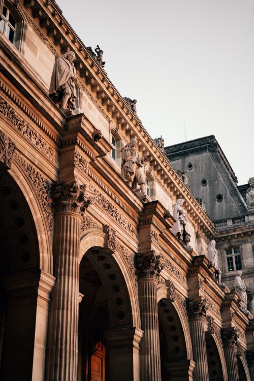 Free Elegant facade of the historic Palais Garnier opera house in Paris, showcasing classic architecture. Stock Photo