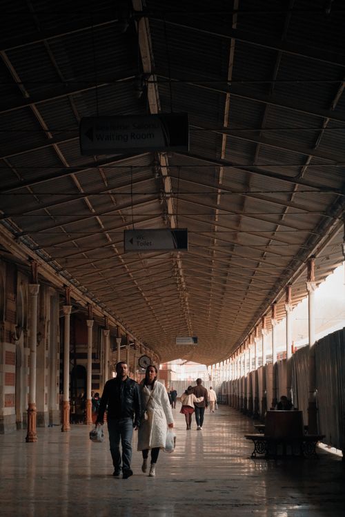 Free People walking inside the iconic Sirkeci railway station in Istanbul, a vibrant urban travel hub. Stock Photo