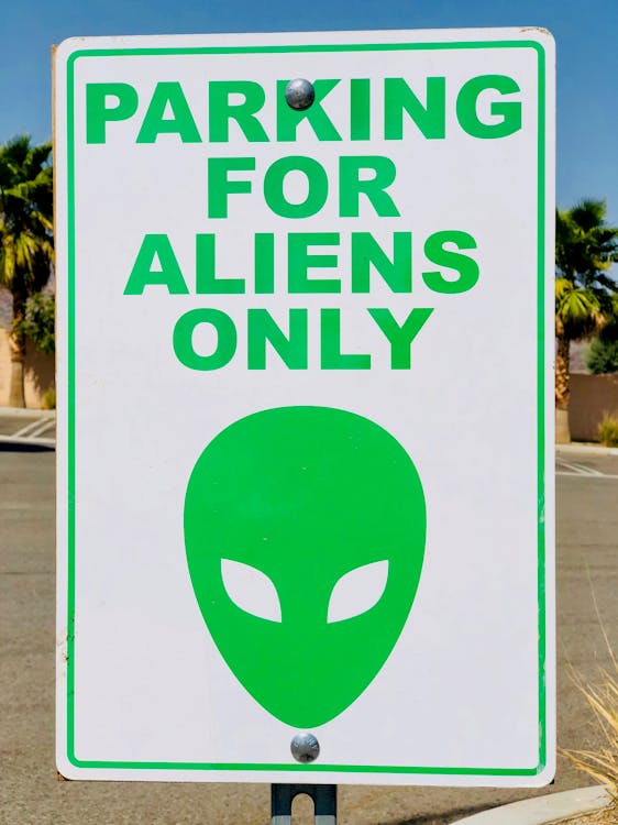 Free Photo of Parking for Aliens Only Signage Stock Photo