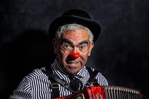 Portrait of Man as Clown with Heart Nose