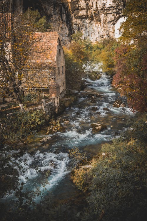 Rapids on Rocks by House in Bosnia and Herzegovina