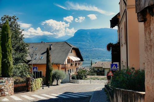 Street in a Town with a View of Mountains in the Distance 