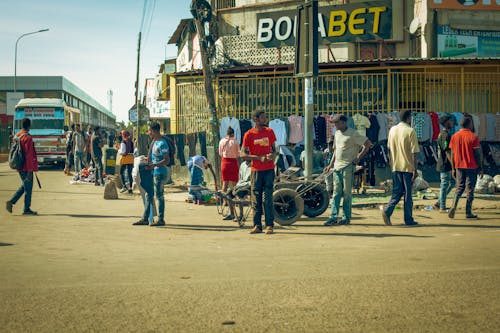 Men and Bazaar on Street in Town