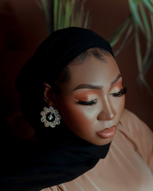 Photo of a Young Woman in a Hijab Wearing a Glamour Makeup Look 