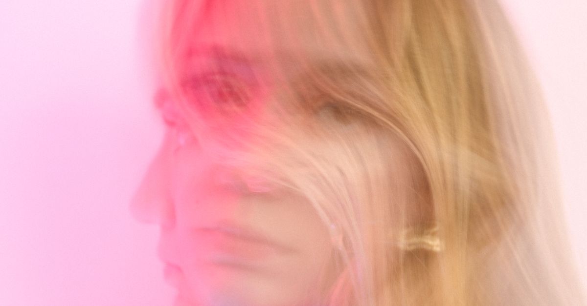 Pink Distorted Portrait Blurred Portrait of a Woman in Pink Hue · Free Stock Photo