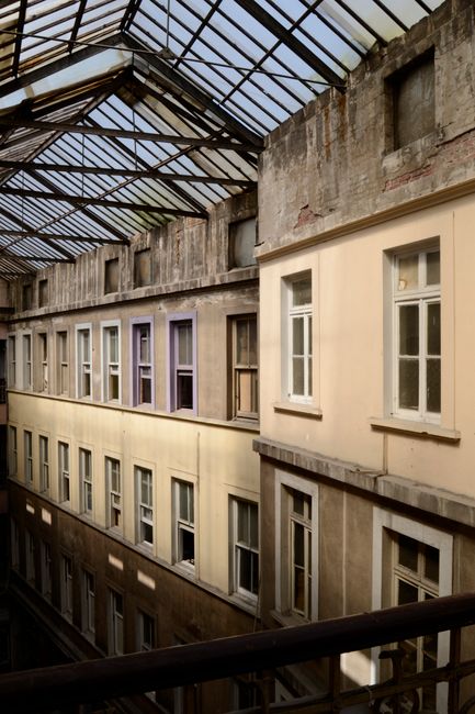 Explore the historic essence of Istanbul through an indoor view of a classic apartment complex.