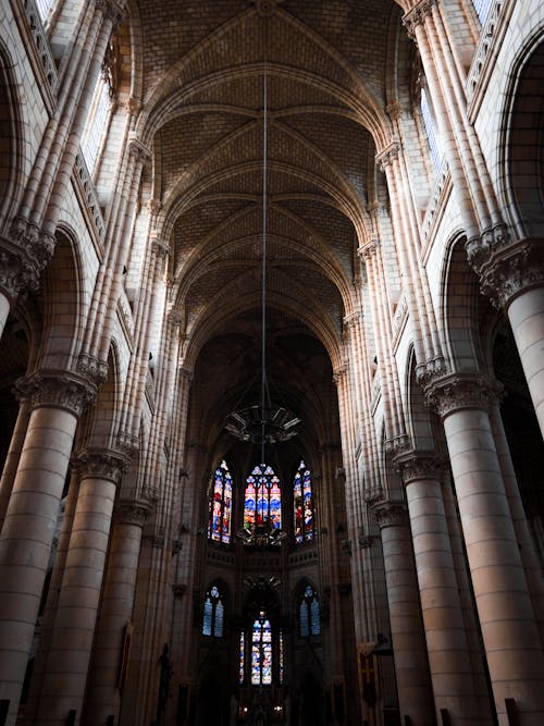 The interior of a cathedral with many windows