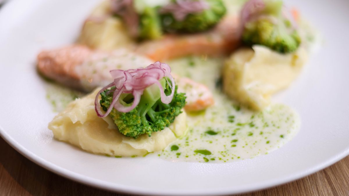 Baked fresh salmon with broccoli and parsley