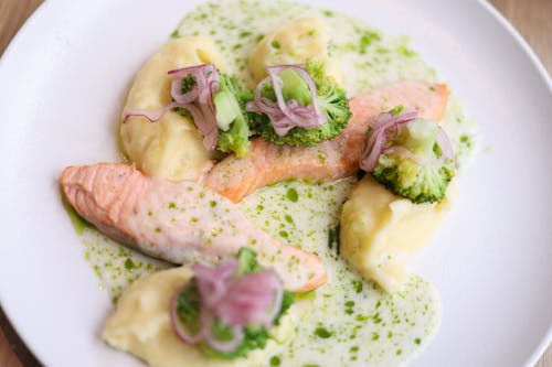 Close-up of Salmon in Sauce with Broccoli 
