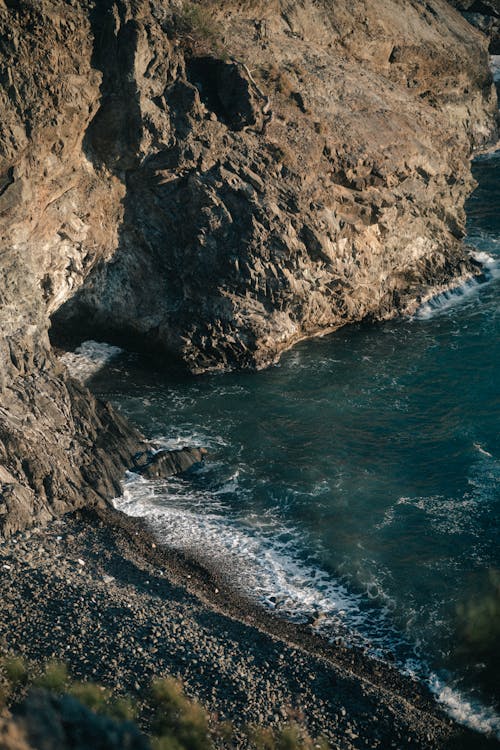 Rocks around Cave on Sea Shore