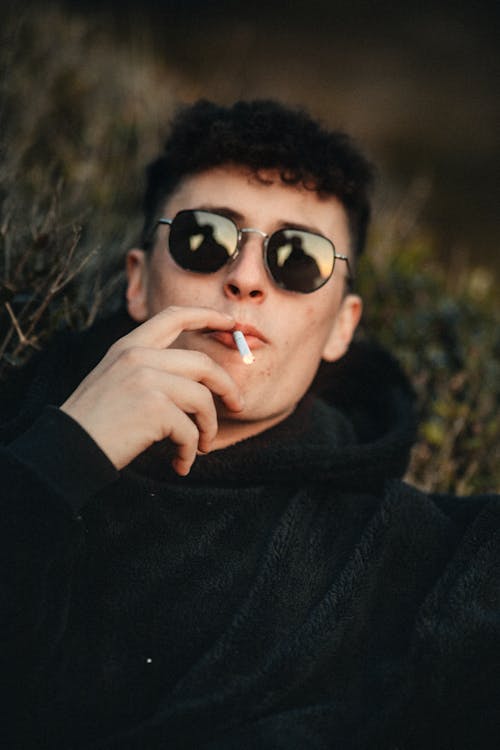 Portrait of Man Smoking Cigarette