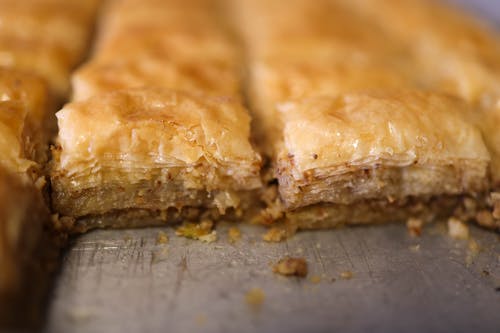 Slices of Shortcrust Pastry with Crushed Nuts and Honey
