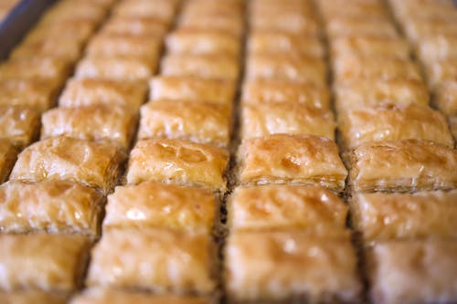 A tray of baklava sitting on top of a table