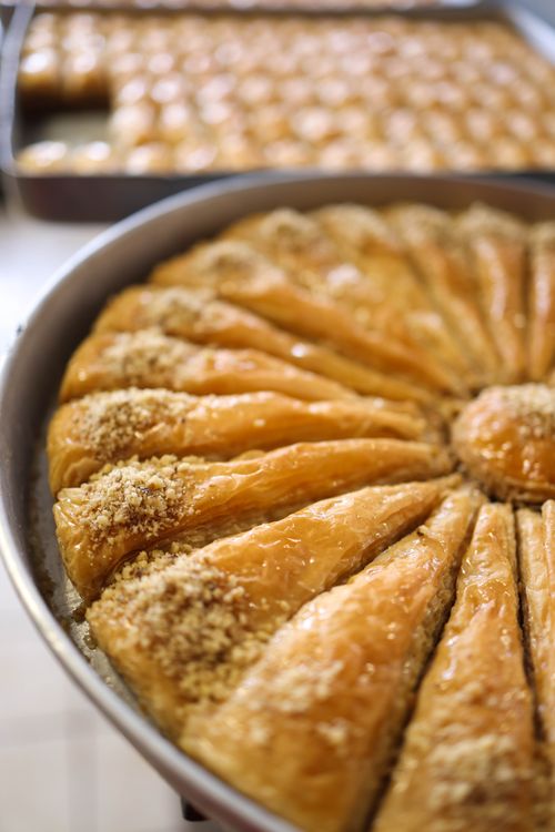 Free Golden baklava slices in a tray, showcasing traditional sweetness. Stock Photo
