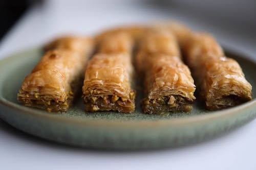 A plate of baklava on a table