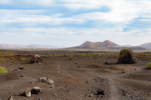 View of an Empty Desert with Hills in Distance 