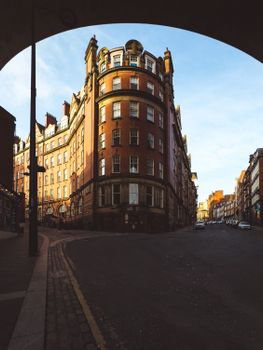 Discover the beauty of historical architecture on a quiet city street at twilight. Perfect for urban exploration.