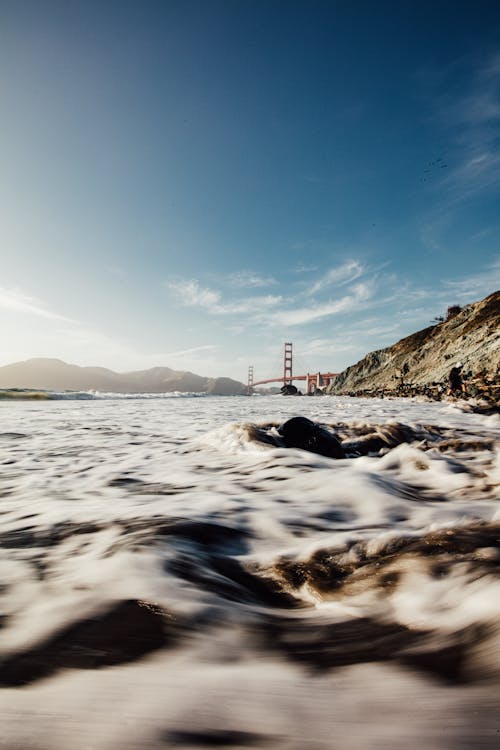 Free Sea Shore with Golden Gate behind Stock Photo