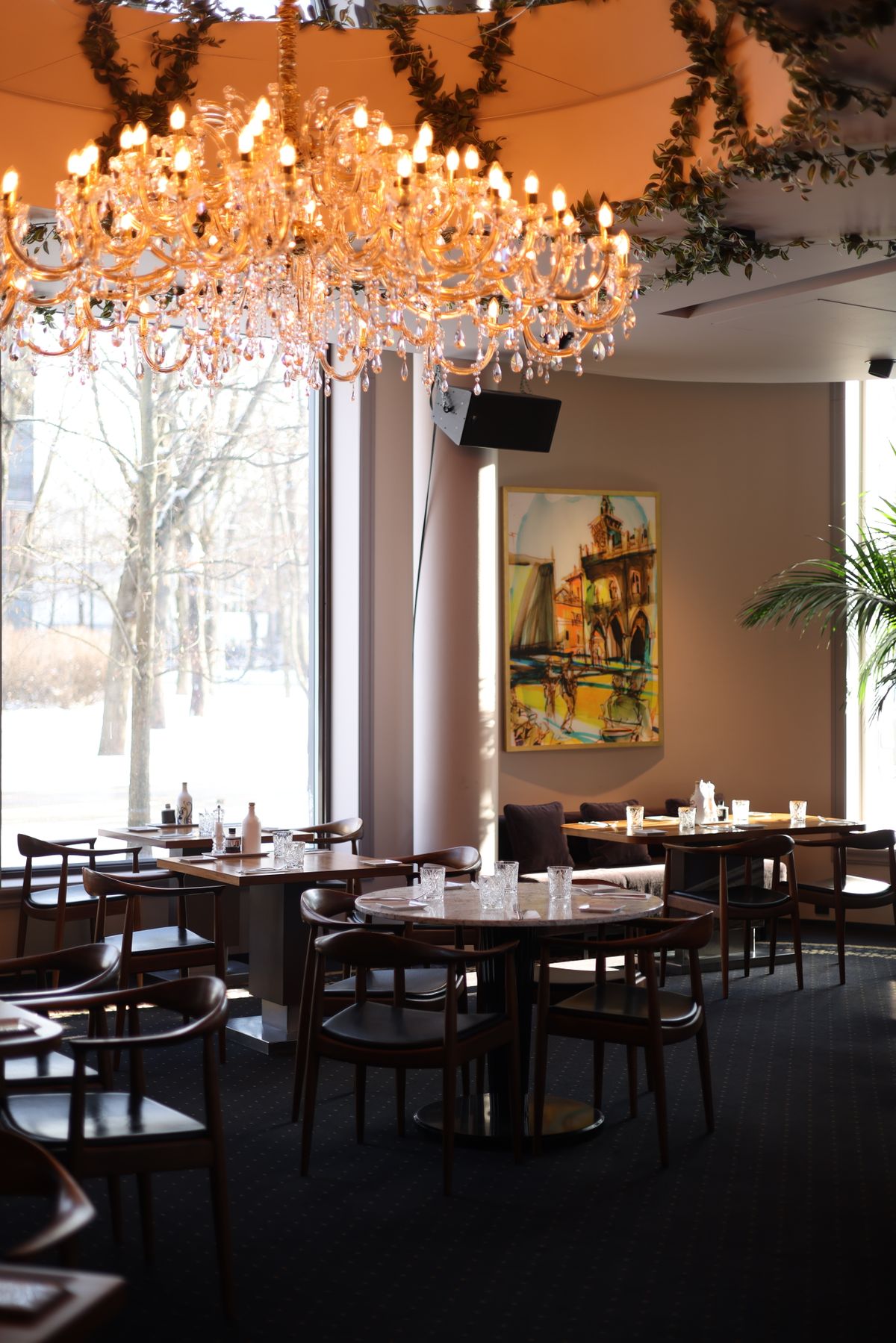 Fine dining salon with ambient chandelier lighting