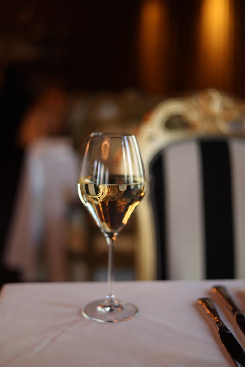 Glass of Champagne on Table in Restaurant