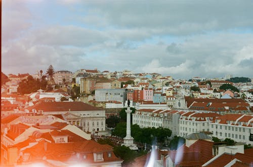 A photo of a city with a red roof