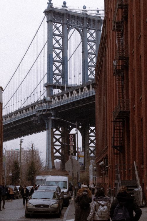Free Urban scene capturing Manhattan Bridge from DUMBO, Brooklyn in New York City. Stock Photo