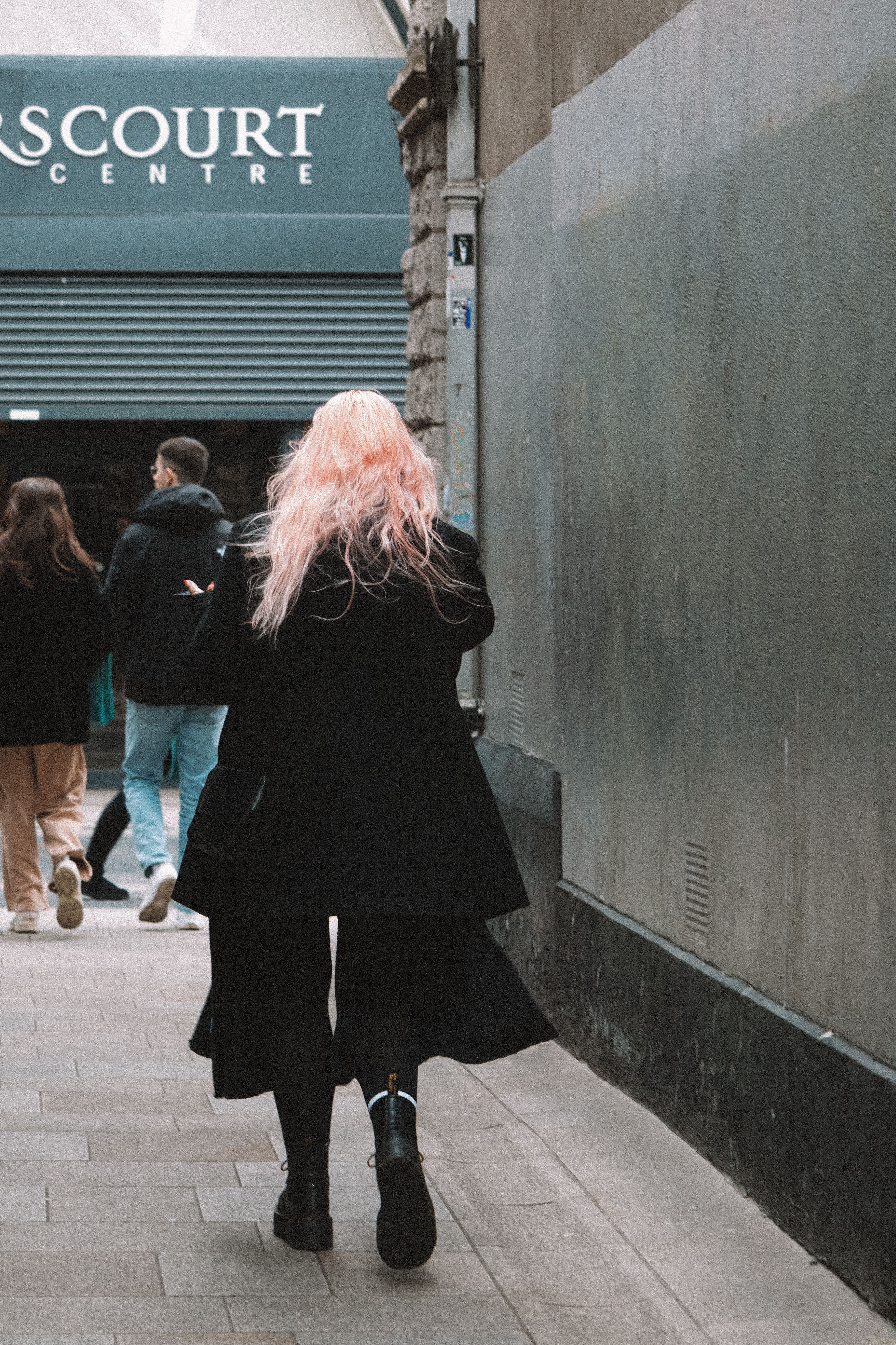 Back View of Woman Walking in Black Coat · Free Stock Photo