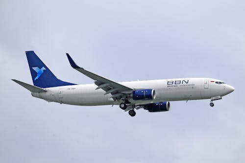 View of BBN Airlines Indonesia Airliner Flying against Cloudy Sky 
