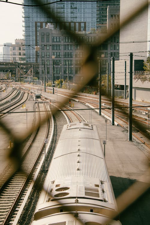 View of a Train Approaching the Station in City 