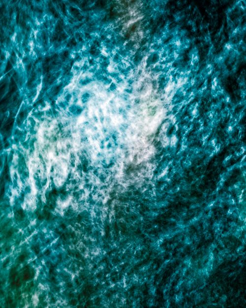 Free Dynamic abstract image of ocean waves in vibrant blue, capturing motion and texture. Stock Photo
