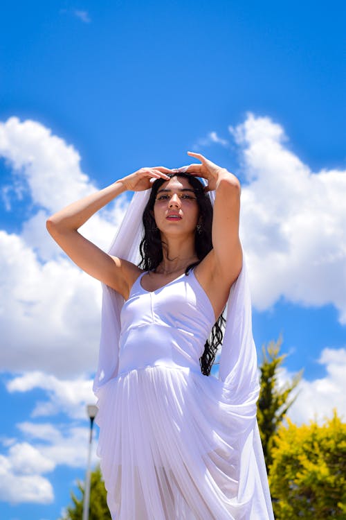 Portrait of Woman Wearing White Dress in Sunlight 