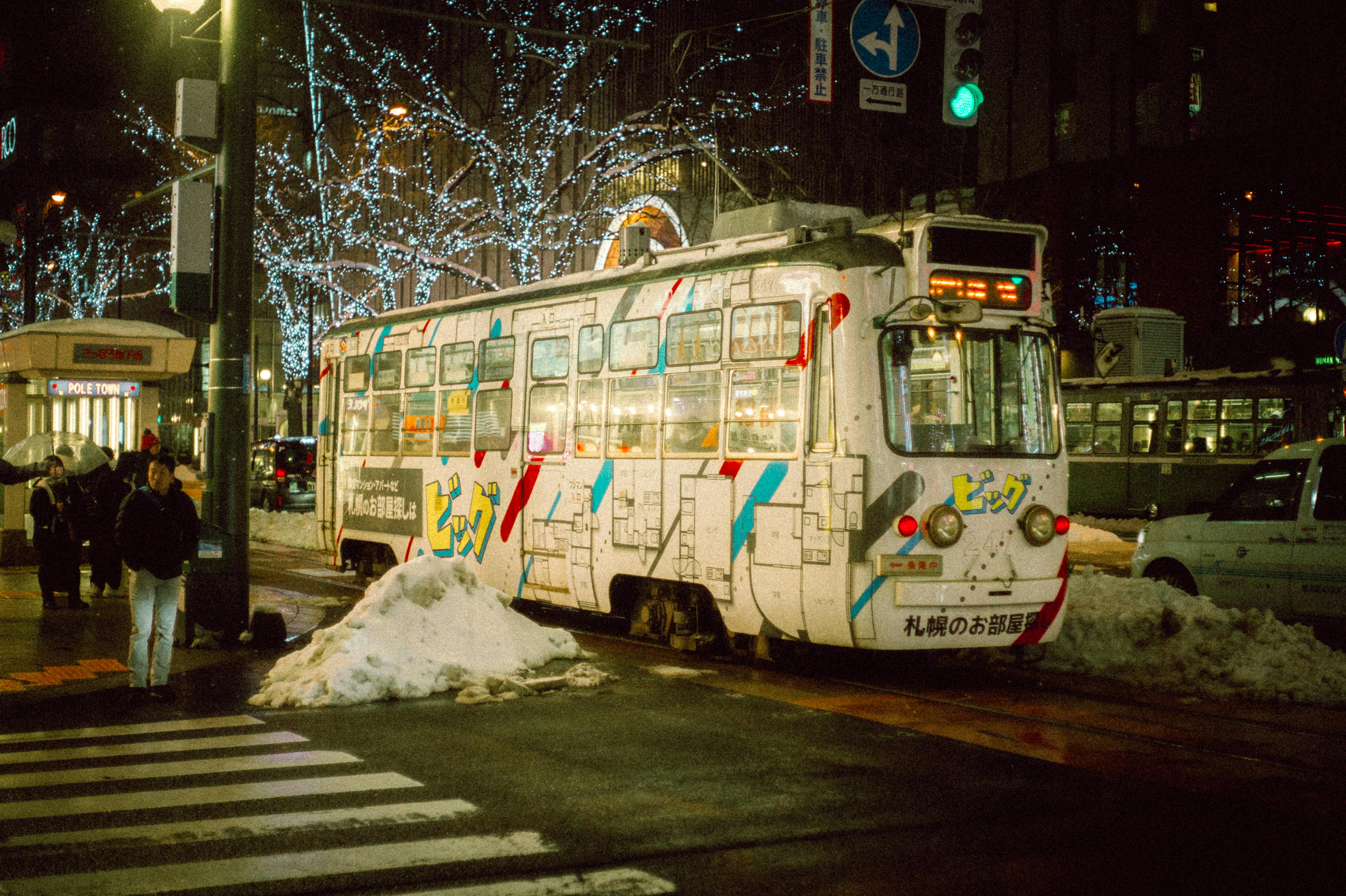 Tram Covered with Graffiti at Night