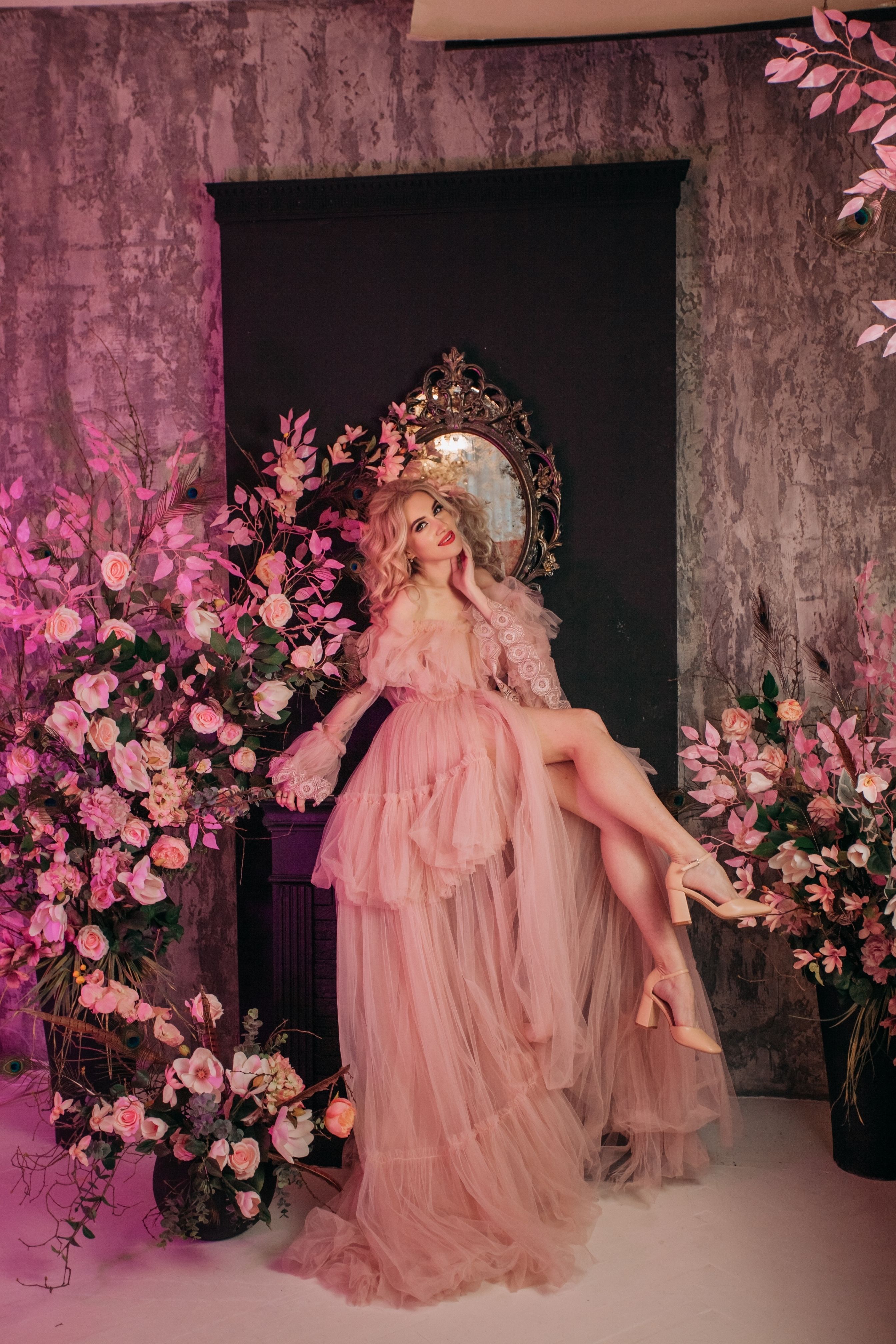 Woman in Pink Dress Sitting in a Chair · Free Stock Photo