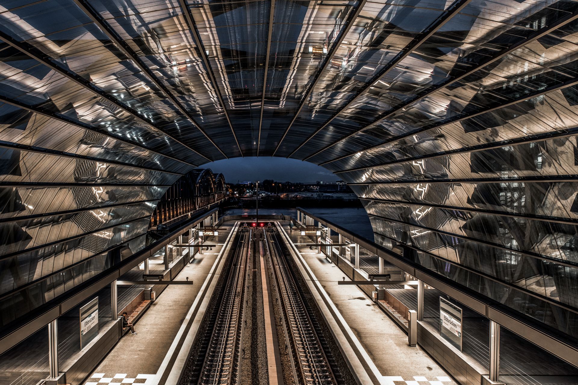 Symmetrical View of Platforms at the Elbbrucken Station in Hamburg, Germany at Night