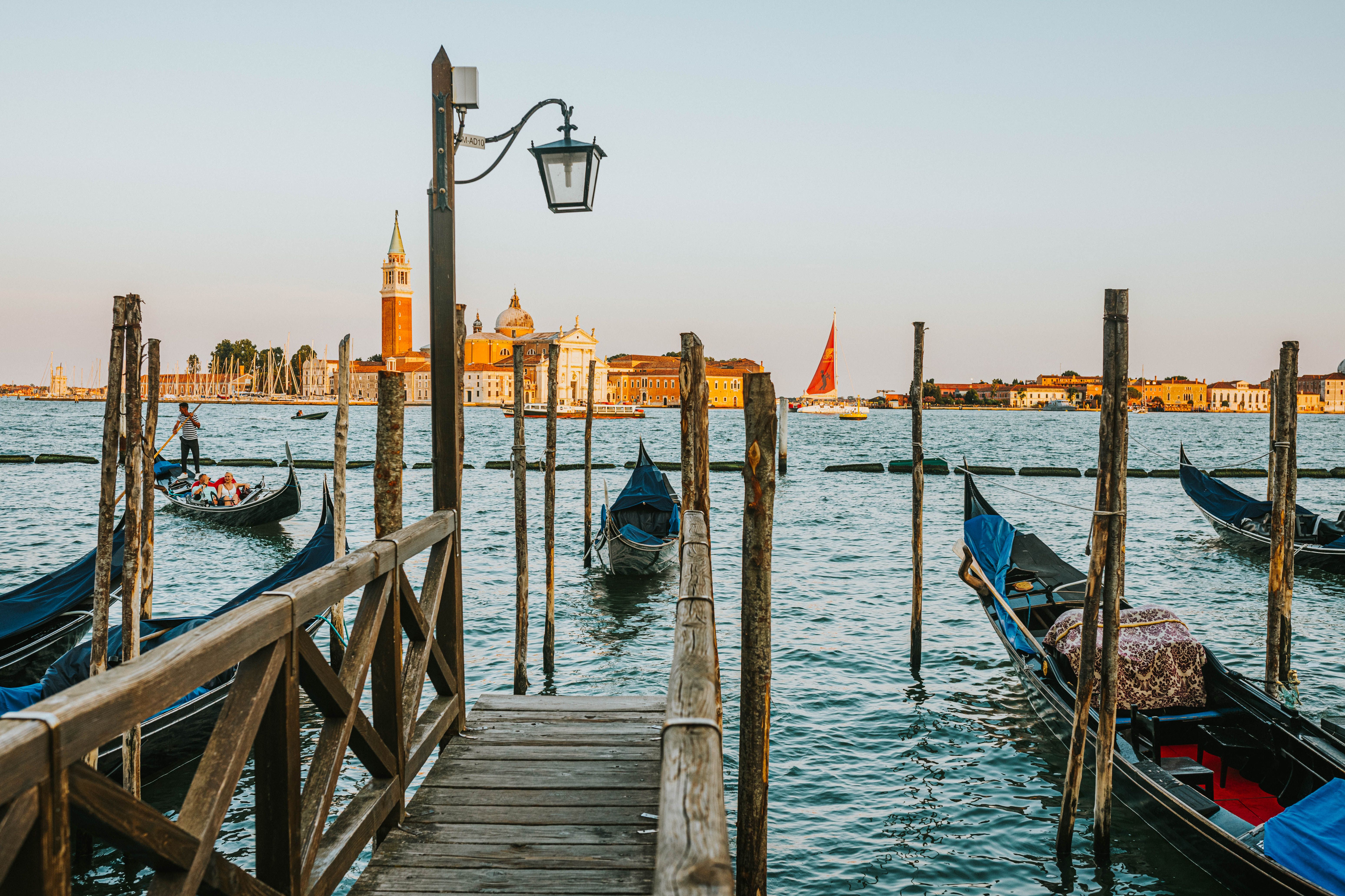 Venice Buildings behind Moored Gondolas at Sunset · Free Stock Photo