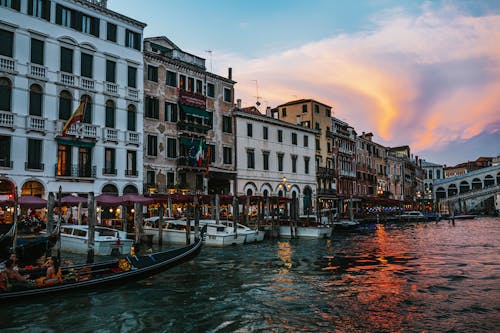 View of Buildings by the Canal and the Rialto Bridge in Venice, Italy