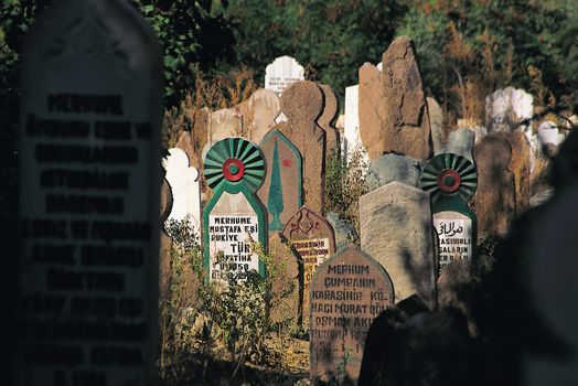 A view of traditional gravestones in a Muslim cemetery in Istanbul, Turkey.