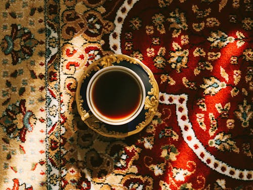 Tea in a Cup on a Traditional Rug 