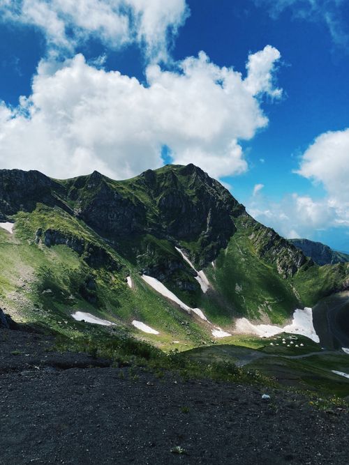 Free Stunning view of lush green mountains under a clear blue sky in Sochi, Russia. Stock Photo
