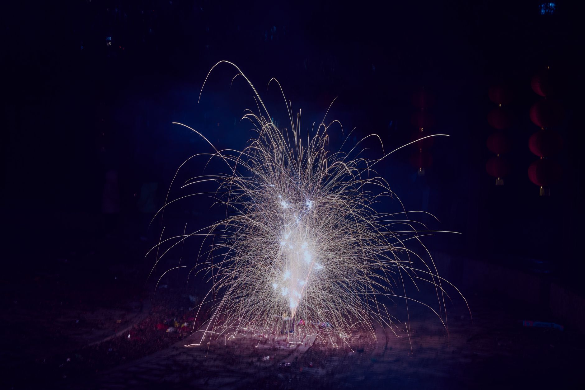 A stunning fireworks display lighting up the night sky with vibrant sparks and colors.