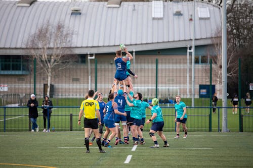 Rugby Sevens Players Competing in a Lineout