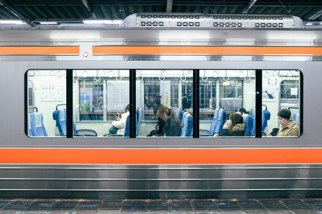 Blue Train Window Passengers behind Metro Train Windows · Free Stock Photo