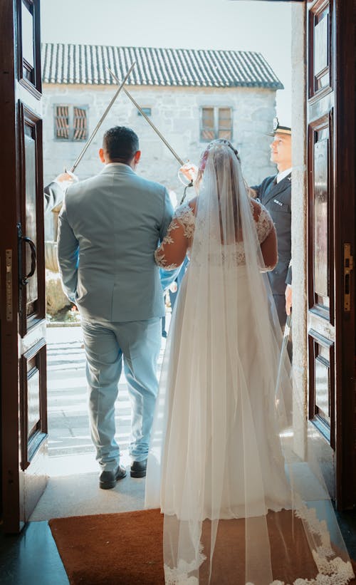 Back View of Newlyweds in Doorway