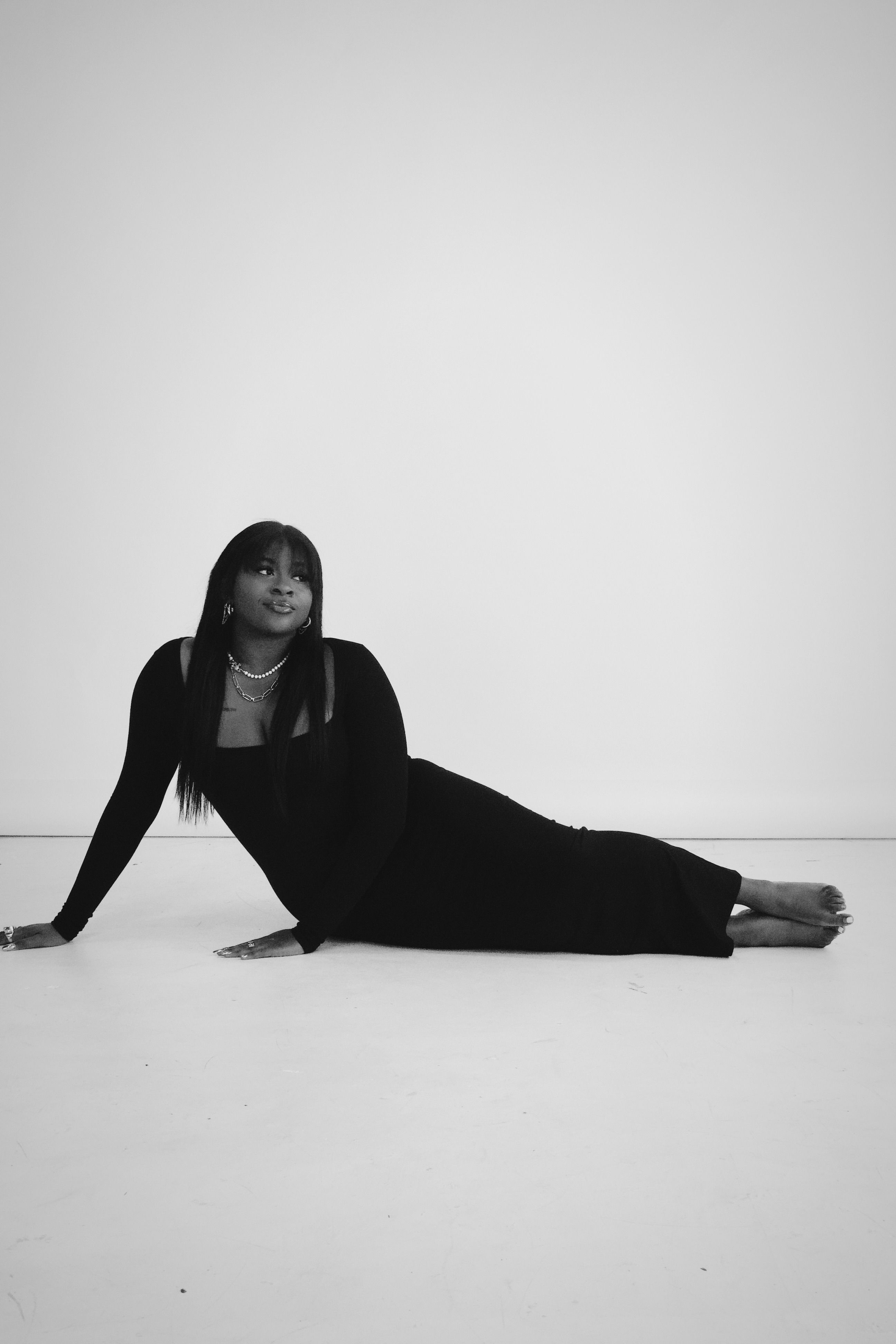 Woman in a Long Dress Sitting on the Floor · Free Stock Photo