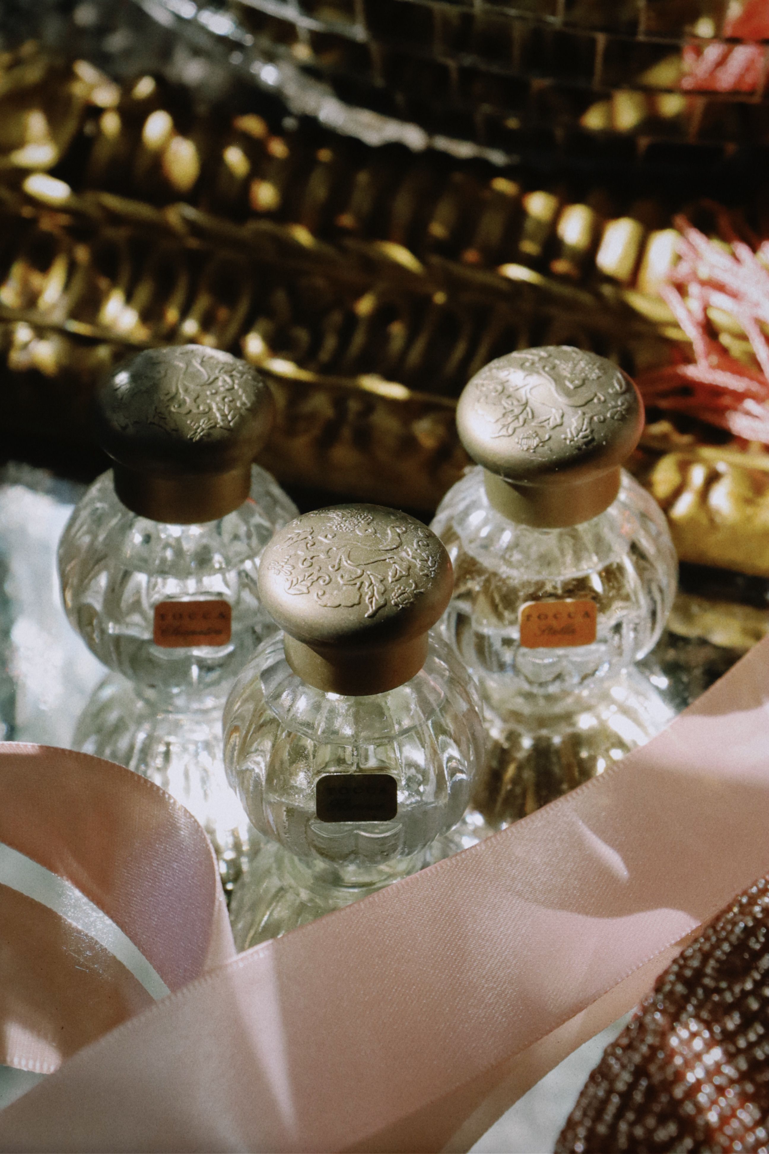 Elegant still life of luxury perfume bottles in a sophisticated arrangement.